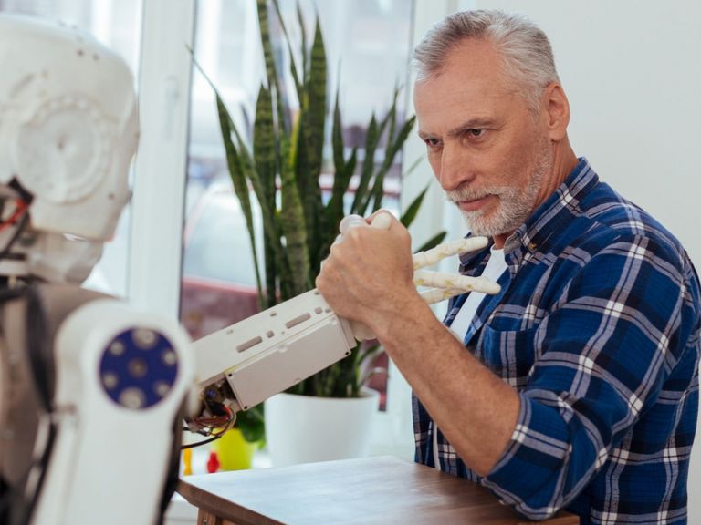 Borger lægger arm med Meta-robot
